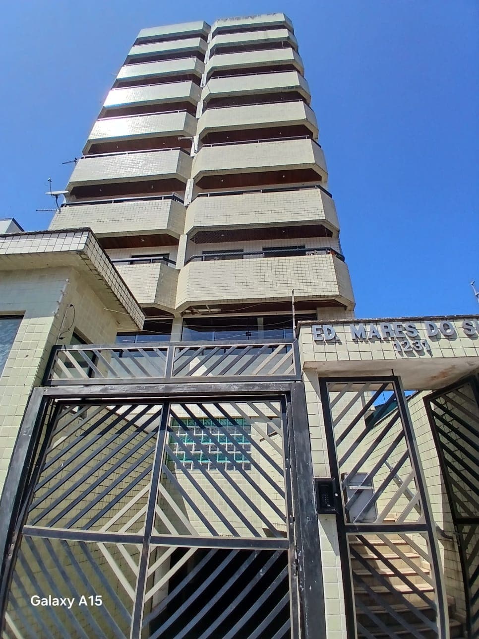 Apartamento Praia Grande Caiçara | 1 dormitório | 300m da praia | Sacada | Elevador | Garagem